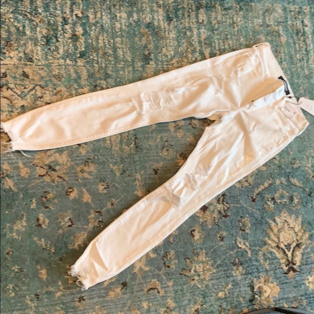 White distressed express jeans